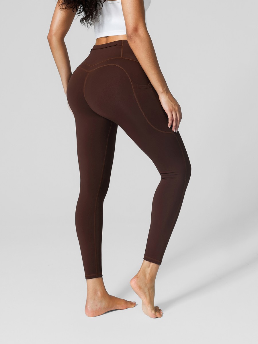 Hot-selling Women High Rise Side Pockets Fleece Lined Breathable Four-Way Stretch Leggings